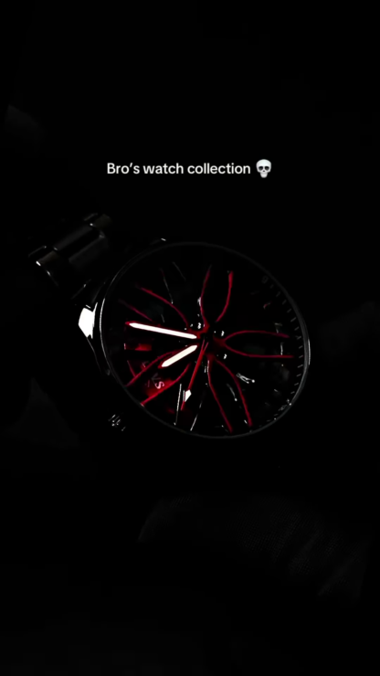 Black Racing-Style Watch with Red Spoke Hands