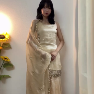 Cream Pakistani-Style Suit with Tassel Detailing