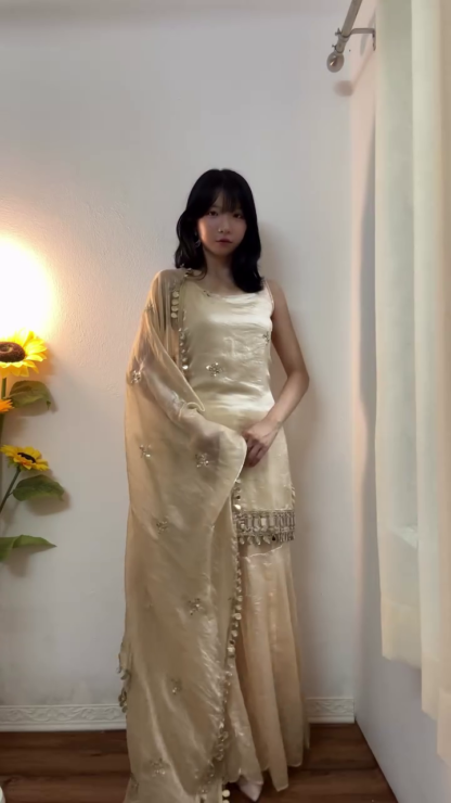 Cream Pakistani-Style Suit with Tassel Detailing