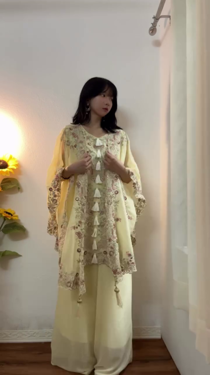 Cream Pakistani-Style Suit with Tassel Detailing