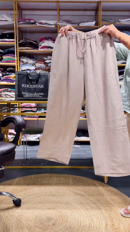 Black Shirt with Chest Pocket Embroidery and Beige Relaxed Pants
