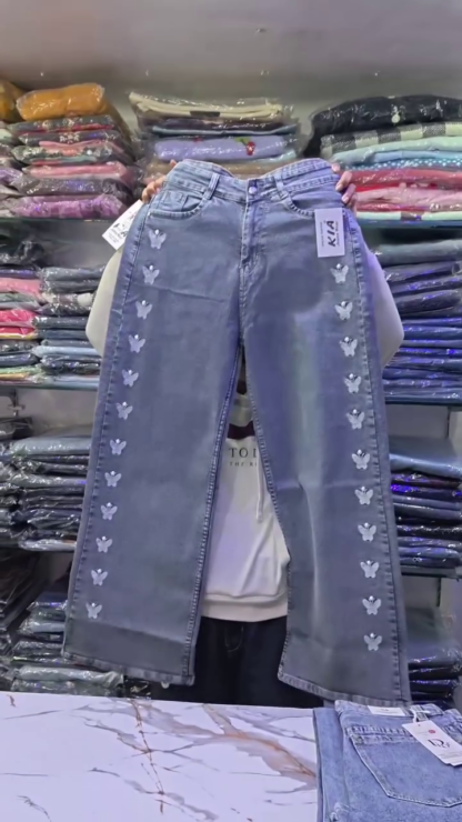 Wide-Leg Blue Denim Jeans with Butterfly Embellishments